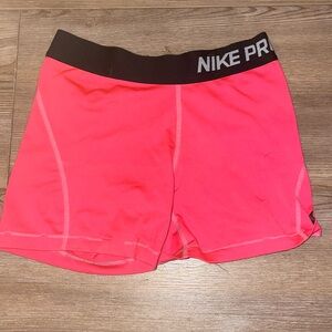 hot pink nike pros size M
